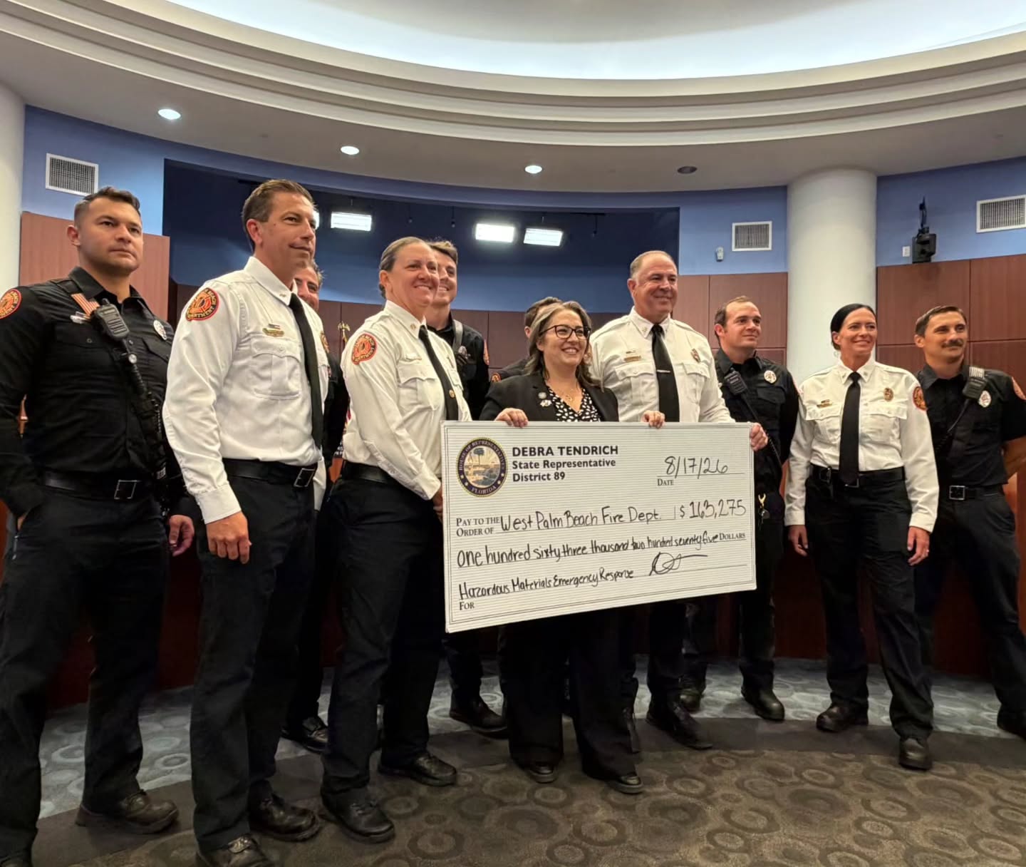 West Palm Beach firefighters at a ceremonial partnership presentation